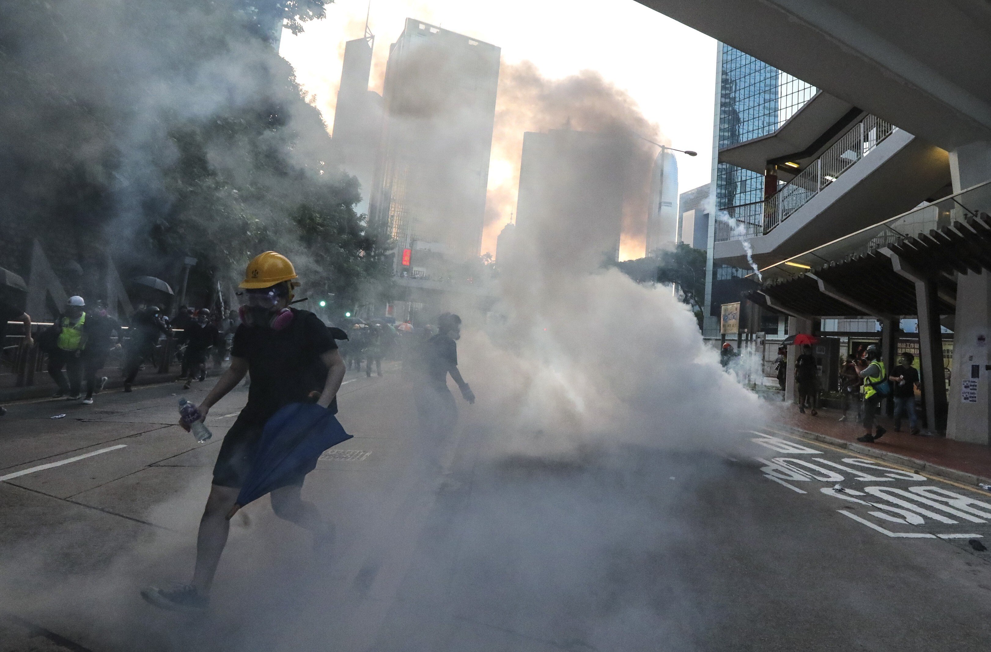 Riot police fire tear gas at protesters at a rally on Hong Kong Island on September 15 last year. Photo: Felix Wong