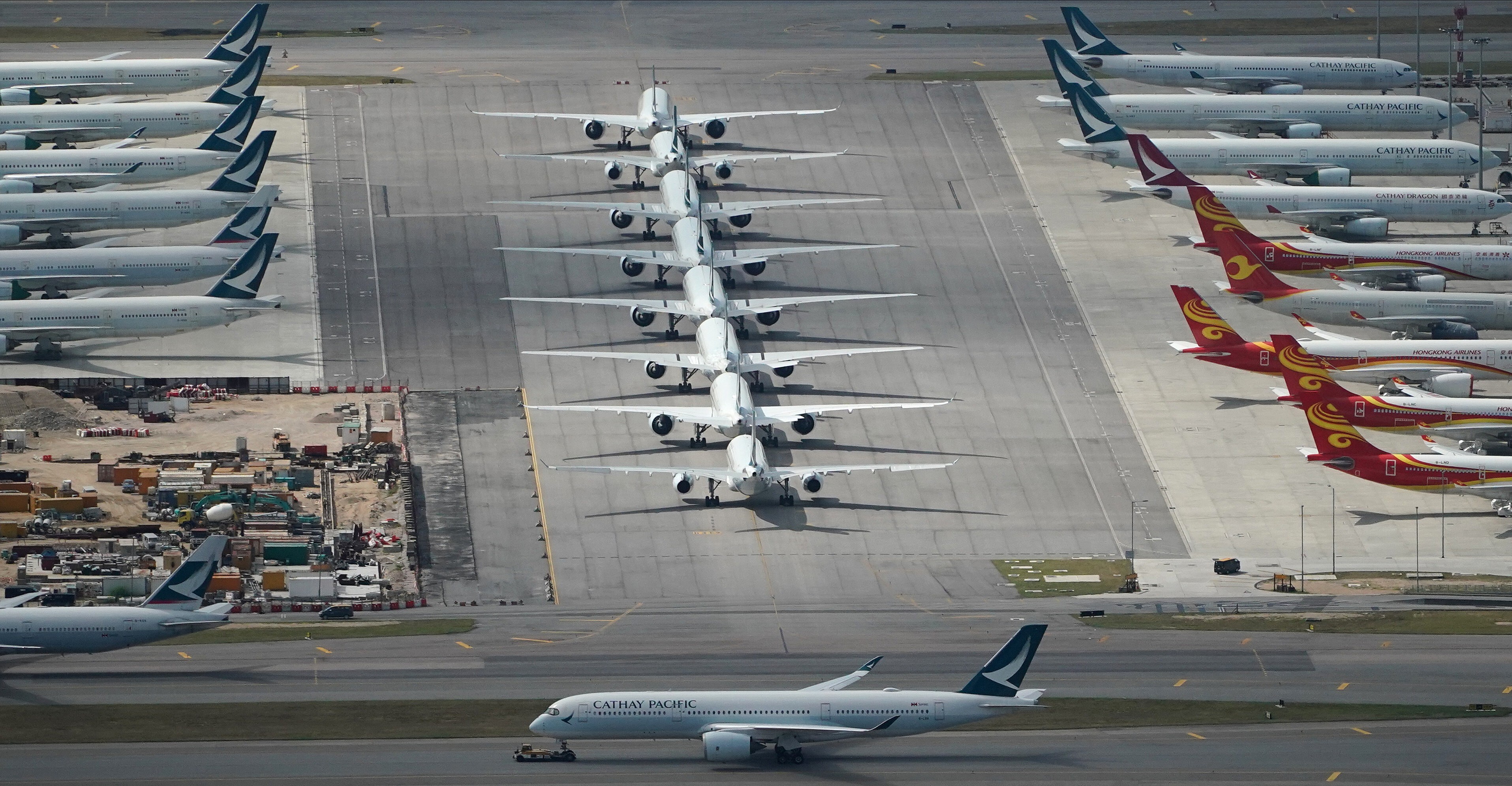 Battered by the coronavirus pandemic, Cathay Pacific has cut its flights and plans to put about a third of its passenger planes in long-term storage. Photo: Felix Wong