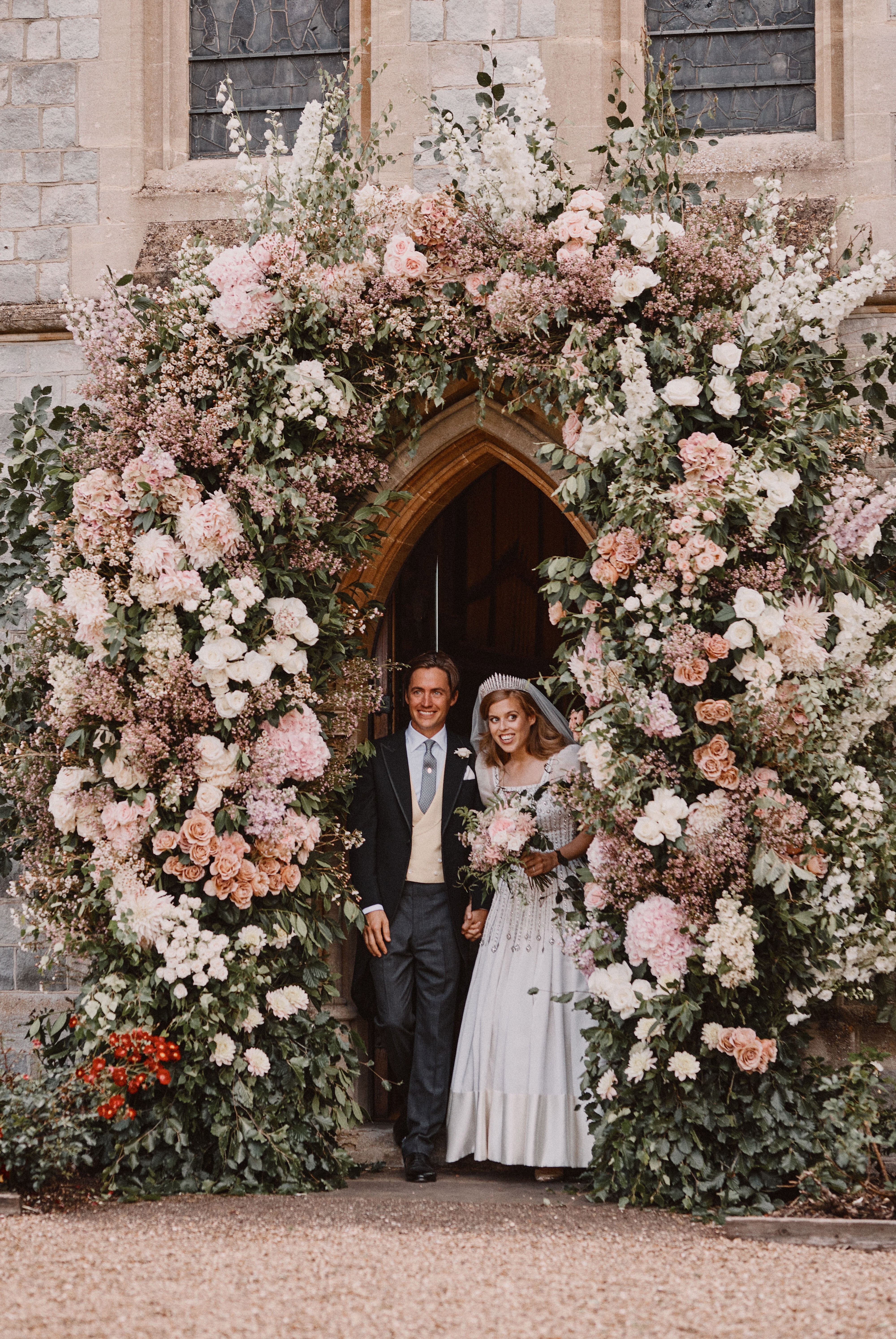 Keeping up traditions – Princess Beatrice and real estate developer Edoardo Mapelli Mozzi leaving the royal Chapel of All Saints at Windsor after their wedding on July 17. Photo: EPA-EFE