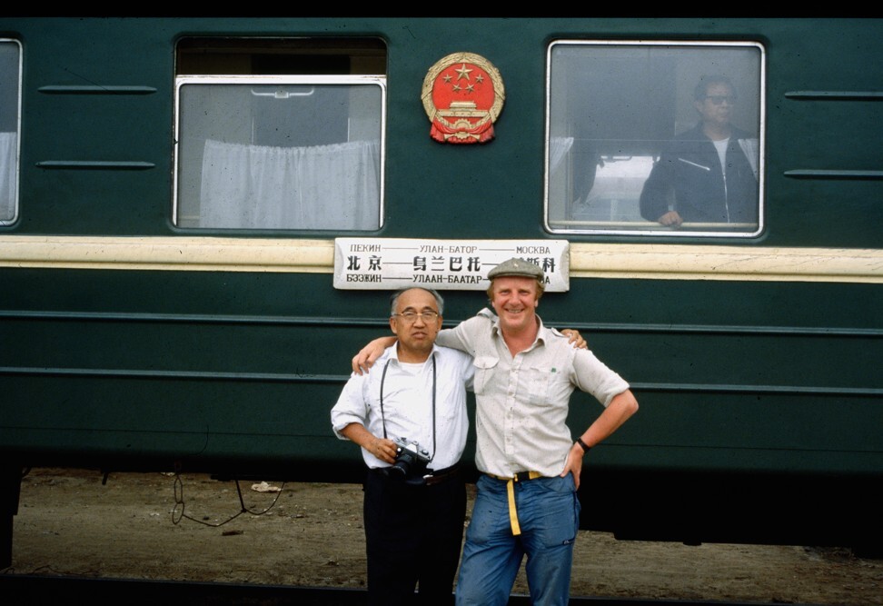 Photographed in Beijing, in front of the train from Moscow, Bruce Connolly is welcomed to China in 1987 by one Mr Li. Photo: Bruce Connolly