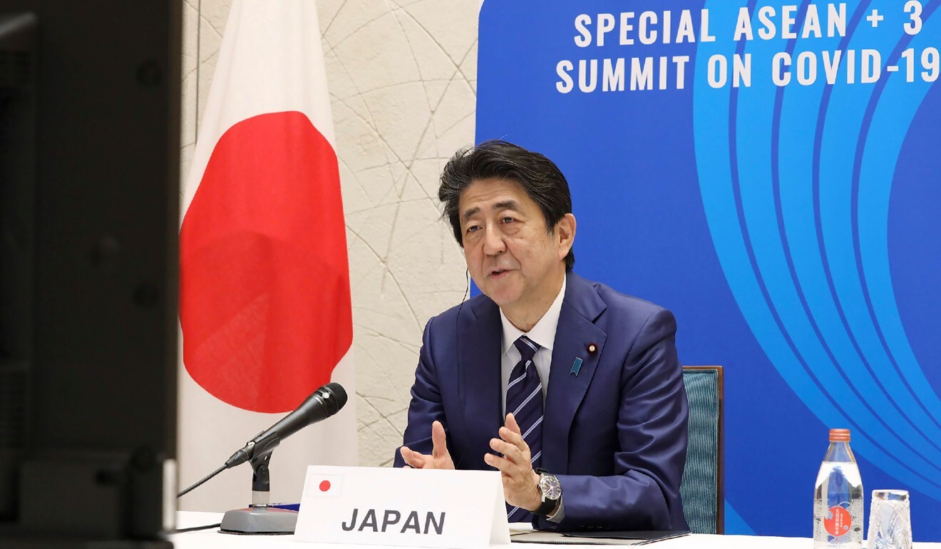 Japan's Prime Minister Shinzo Abe speaks from Tokyo with other Asean leaders during a video conference on Covid-19. Photo: AFP