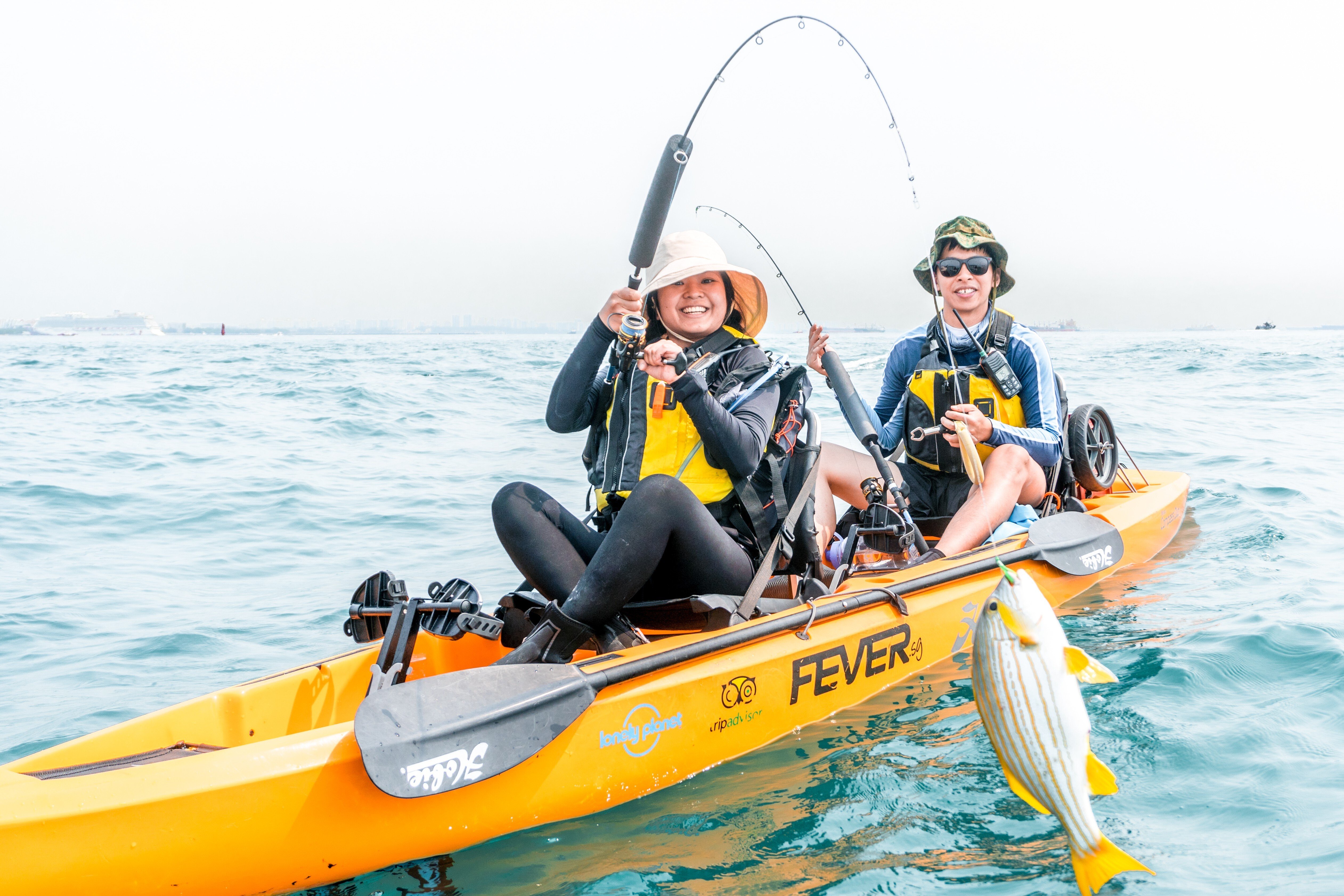A woman catches a fish during a trip with Kayak Fishing Fever in Singapore. With international tourism on hold, the Singaporean government is encouraging residents to explore different sides of the city state. Photo: Kayak Fishing Fever