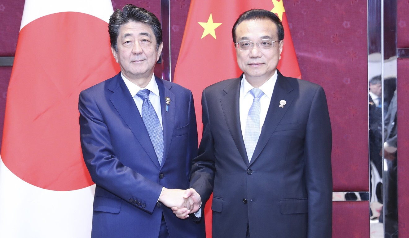 Japanese Prime Minister Shinzo Abe and Chinese Premier Li Keqiang. Photo: Xinhua