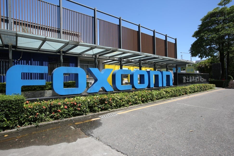 The logo of Foxconn Technology Group, the world’s largest electronics contract manufacturer, is seen at its production complex in Longhua District, Shenzhen. Photo: Nora Tam