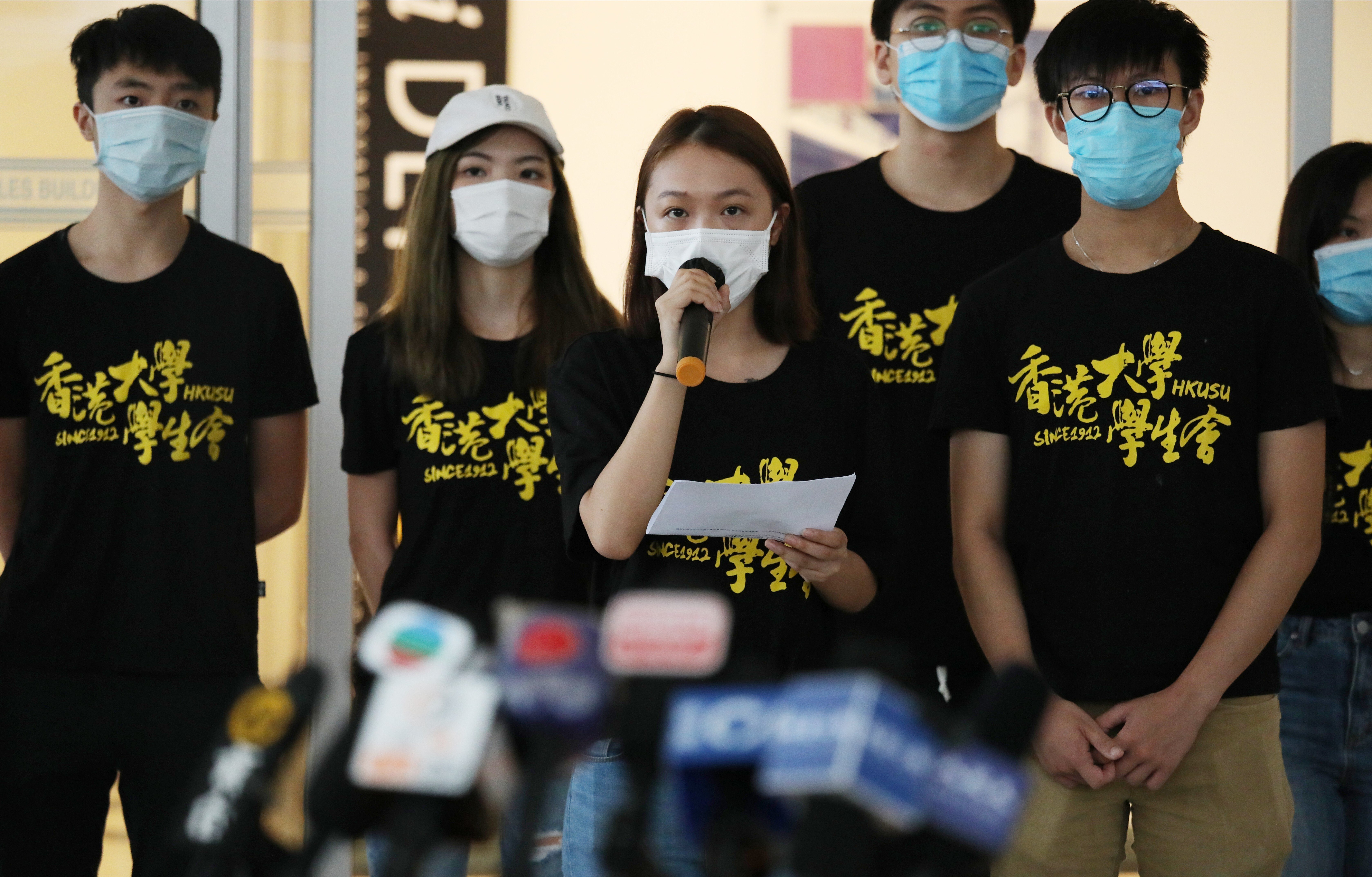 Representatives of HKU students meet the press as they submit a petition signed by more than 3,000 students and alumni demanding a review of Benny Tai’s dismissal, at the campus in Pok Fu Lam on August 3. Photo: Nora Tam