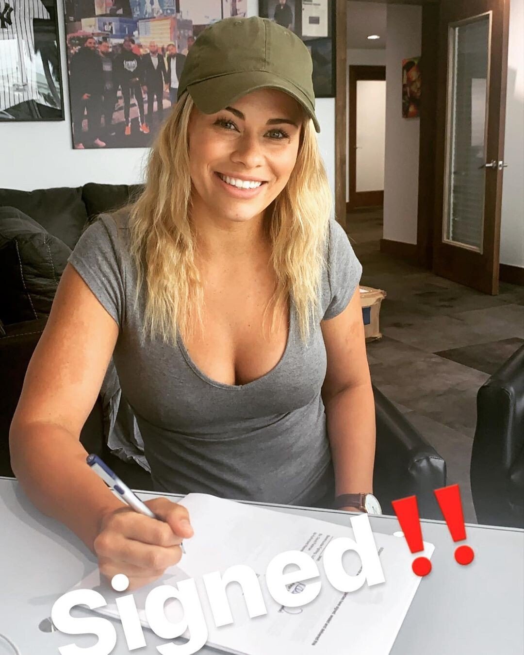 Paige VanZant signs her new Bare Knuckle FC deal. Photo: Instagram
