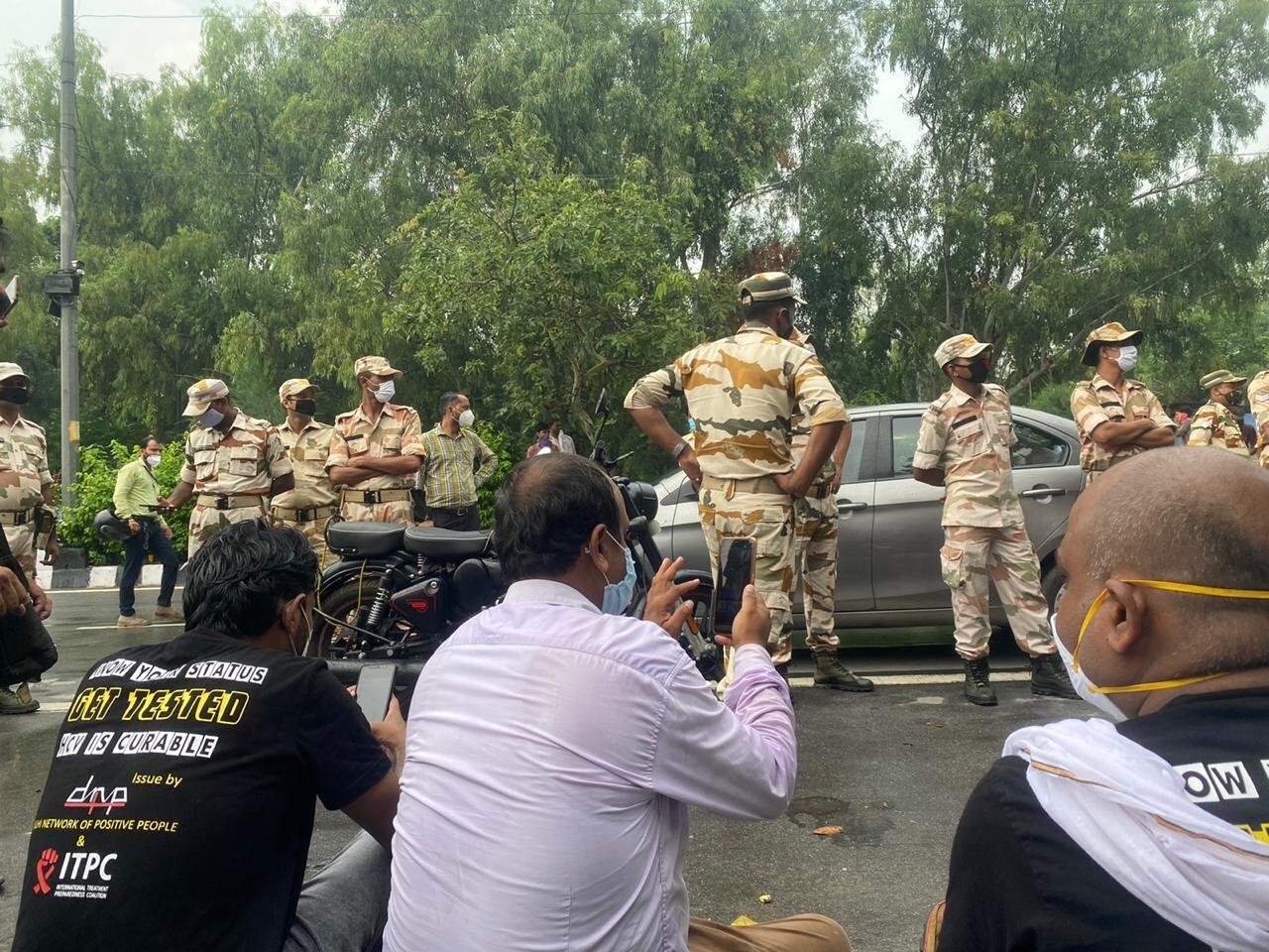 Delhi paramilitary personnel arrive at a protest held by the Delhi Network of Positive People (DNP+) – a group of people and advocates who live with HIV – outside a hepatitis clinic. Photo: Handout
