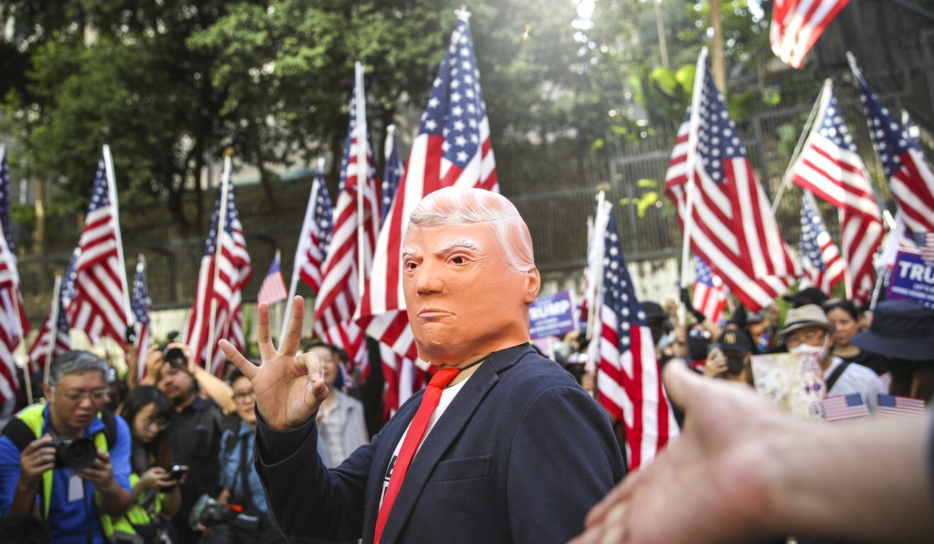 A Donald Trump impersonator gestures during a rally at Chater Garden in December after President Trump signed the Hong Kong Human Rights and Democracy Act into effect. Photo: Winson Wong