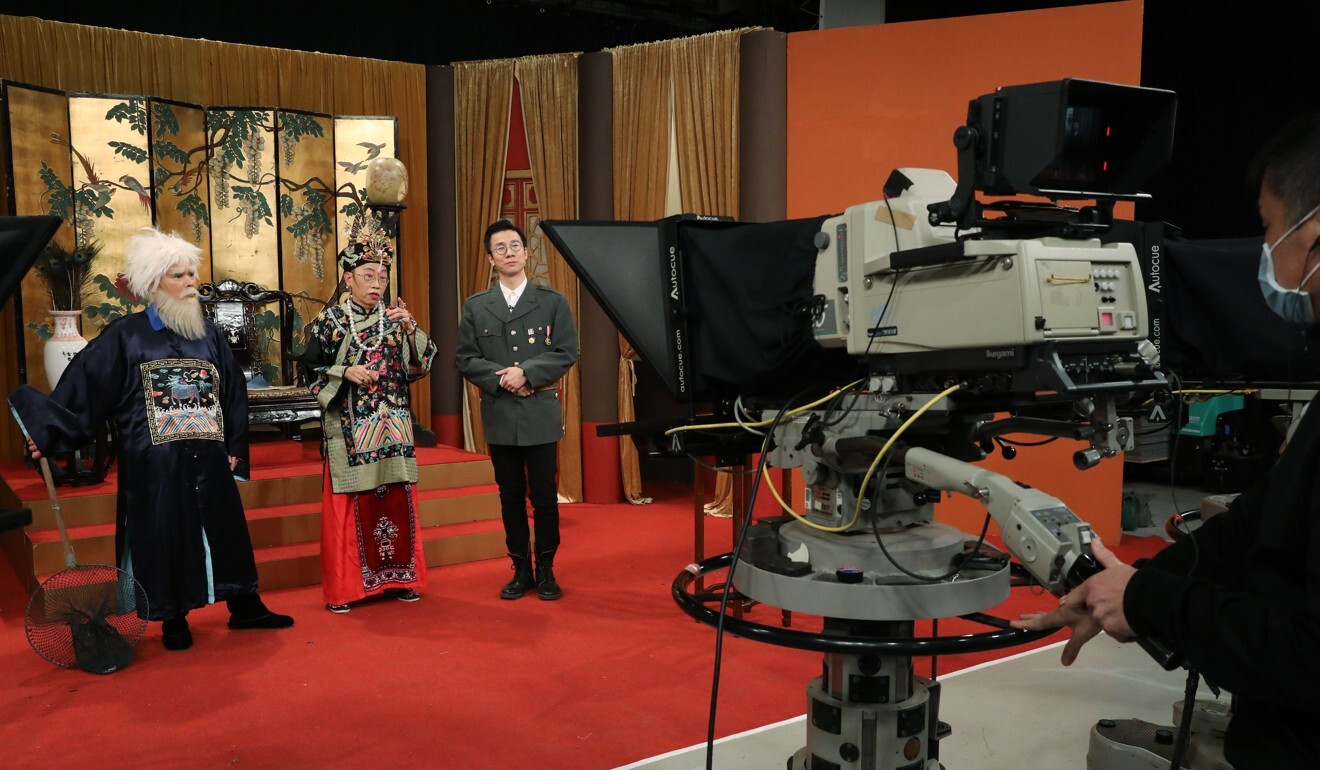 Cuson Law (left), Ng Chi-sum, and Tsang Chi-ho (right), on set for the production of the last episode of the satirical show Headliner, which was criticised for insulting police. Photo: Dickson Lee