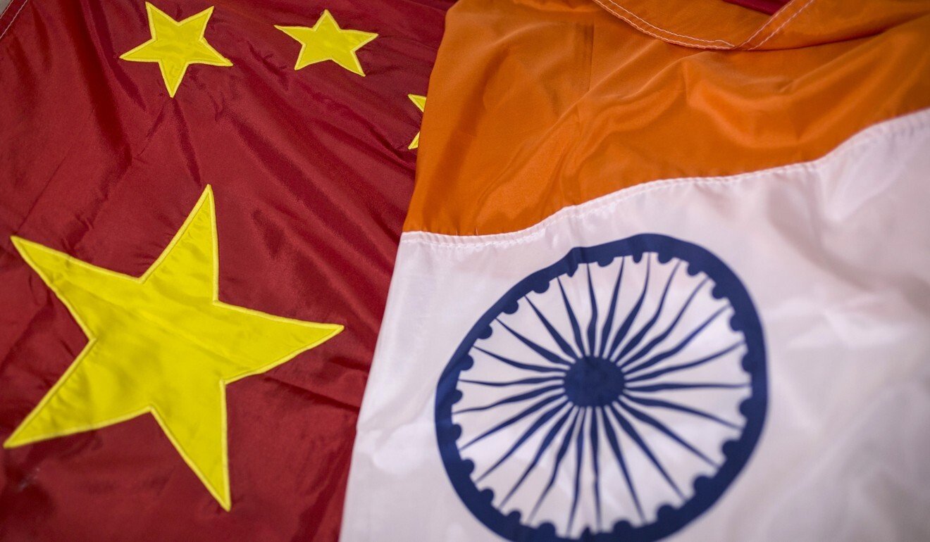 The Chinese and Indian flags. Photo: Bloomberg