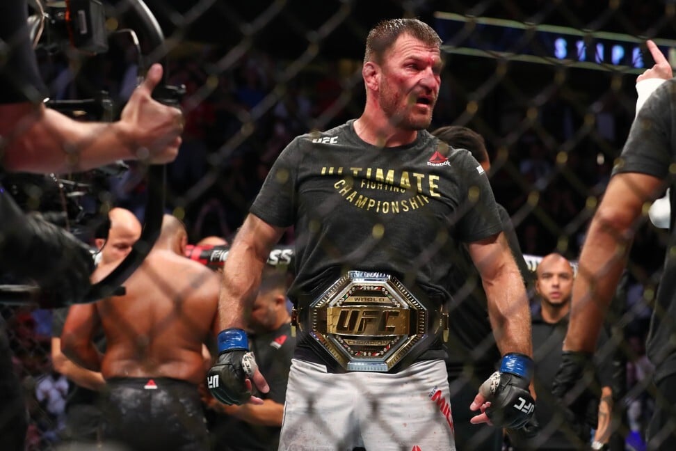 Stipe Miocic celebrates his win over Daniel Cormier in their UFC heavyweight title rematch at UFC 241. Photo: AFP