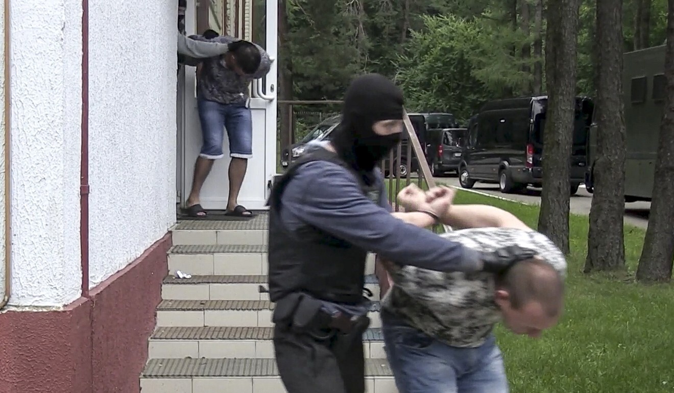 Severak Russian private military contractors were arrested on charges of planning to stage riots in Belarus. Photo: Belarusian KGB, State TV and Radio Company of Belarus via AP