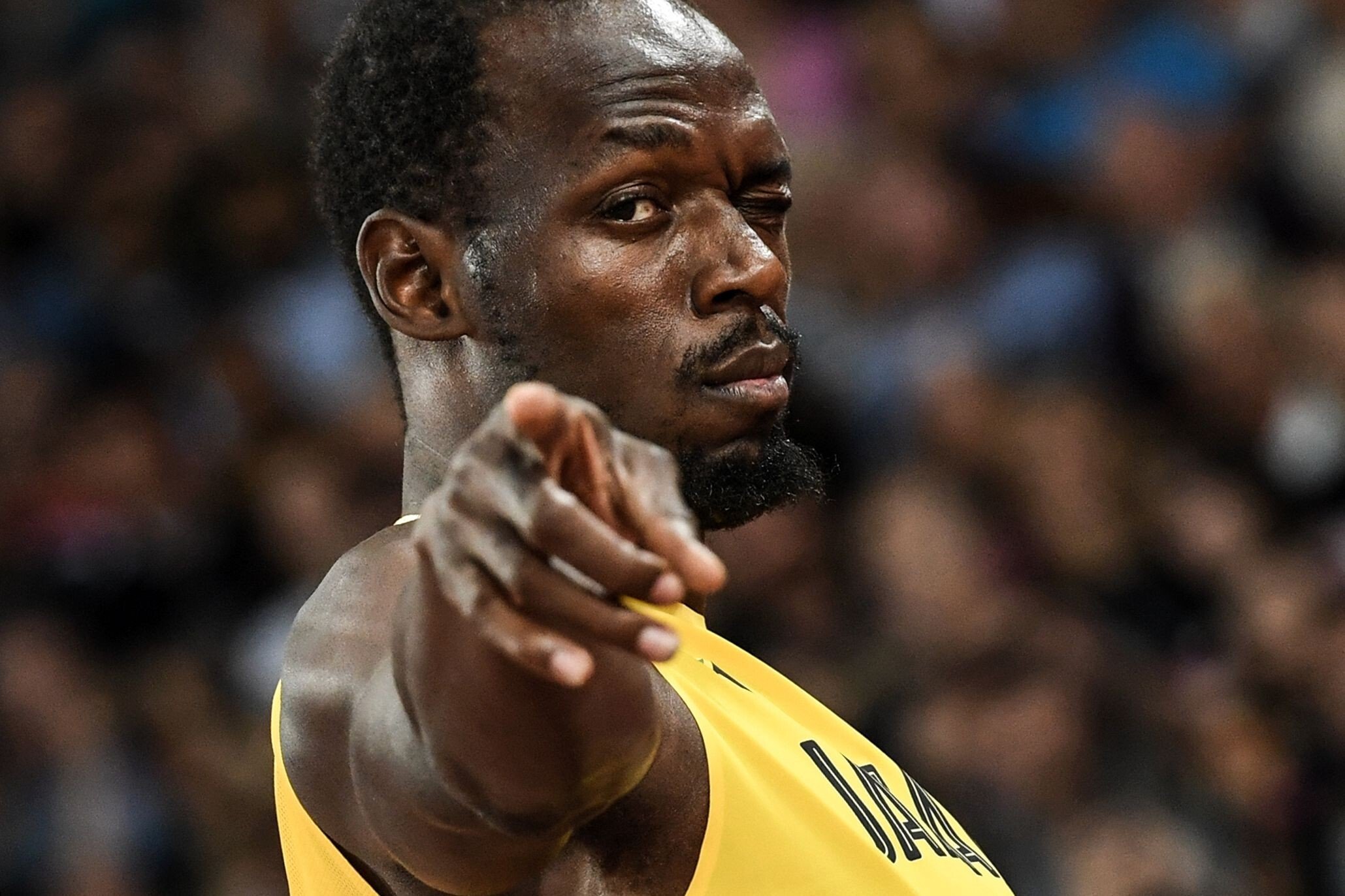 Jamaica's Usain Bolt gestures to the crowd before the start of the final of the men's 4x100m relay athletics event at the 2017 IAAF World Championships at the London Stadium in London, his final ever race. Photo: AFP