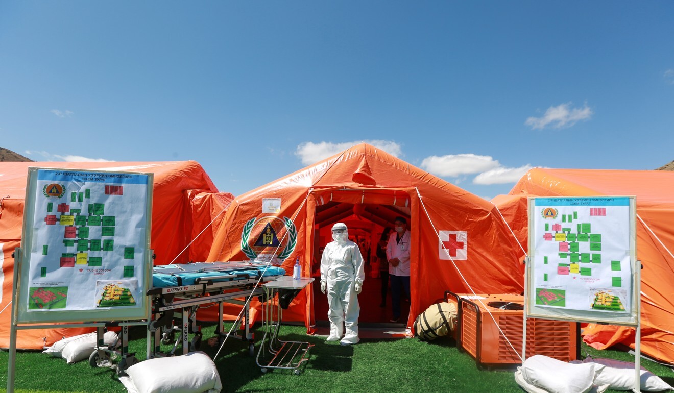 Health workers wear hazmat suits to take part in a coronavirus drill in Ulan Bator, Mongolia. Photo: AFP