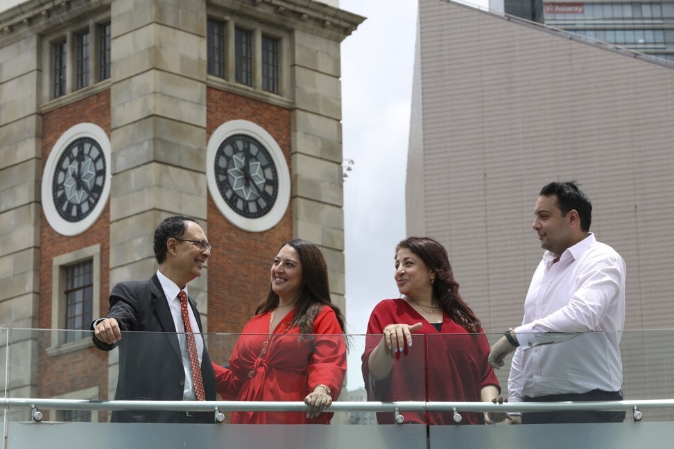 Neville Shroff, president of the Hong Kong Anjuman, with his wife Farida and their children Alisha and Nigel, at the Clock Tower in Tsim Sha Tsui. Photo: Antony Dickson