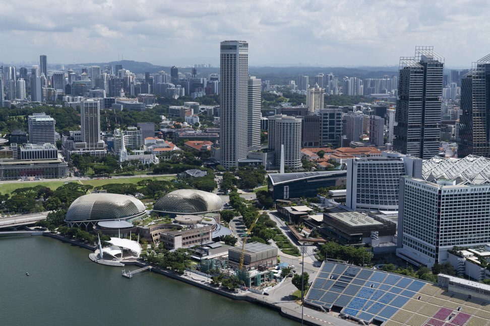 Apple's new Singapore floating store is a sure-fire Instagram hotspot – a  giant apple in the water next to Marina Bay Sands