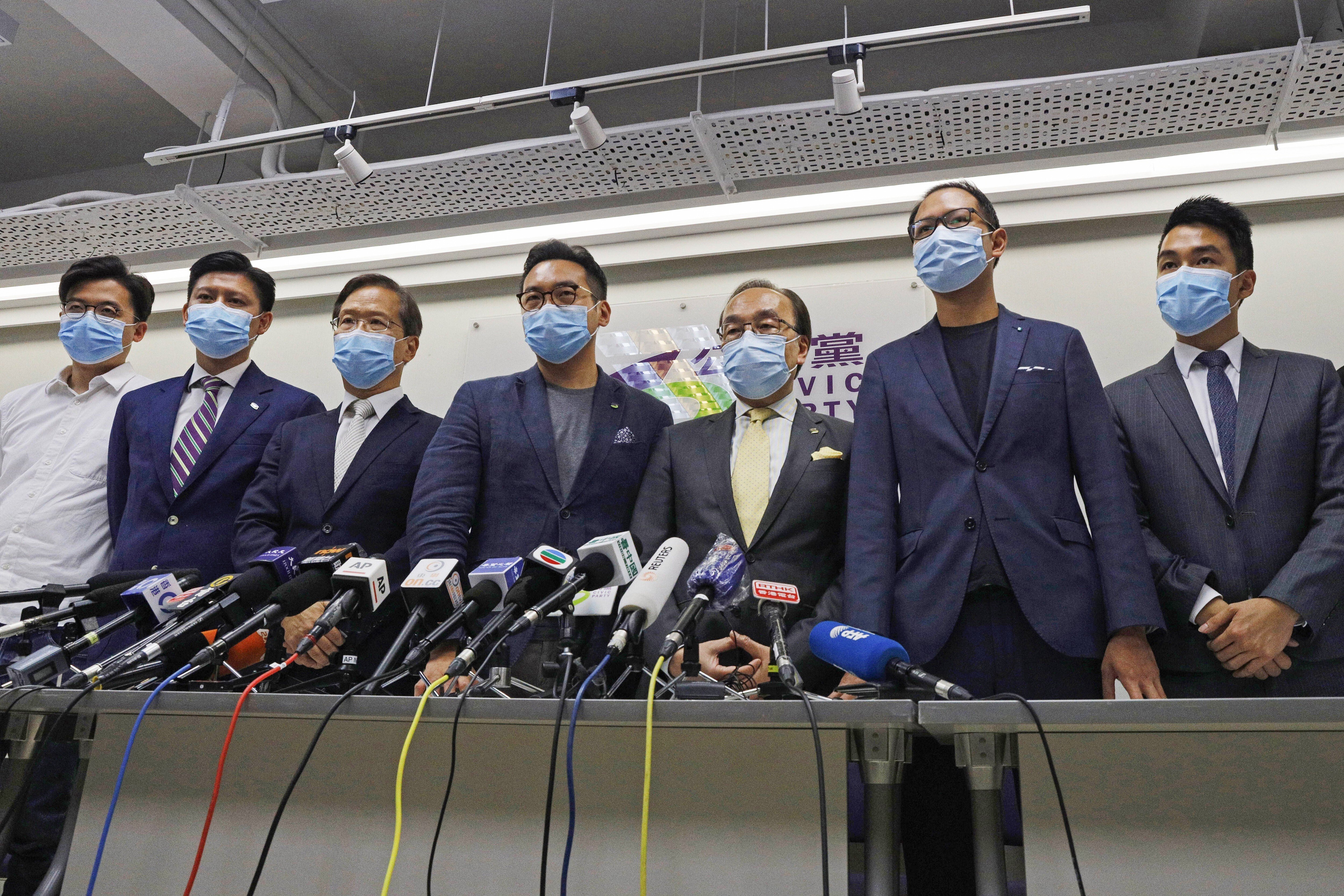 The Civic Party held a press conference on July 30, after four of its members, including incumbent lawmakers Kwok Ka-ki (third from left), Alvin Yeung (fourth) and Dennis Kwok (sixth), were disqualified from the Legco elections. Photo: AP
