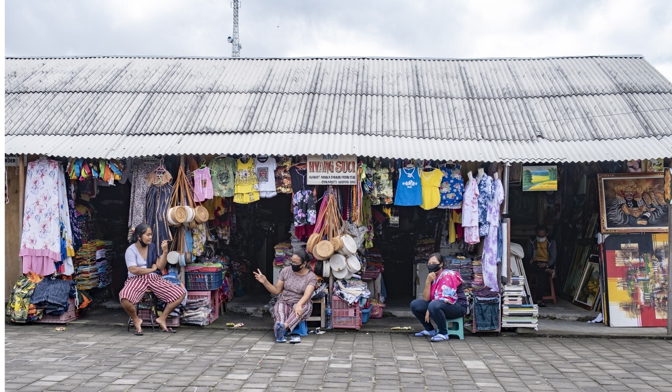 Shopkeepers wait for customers at a market in Gianyar, Bali. Photo: EPA-EFE