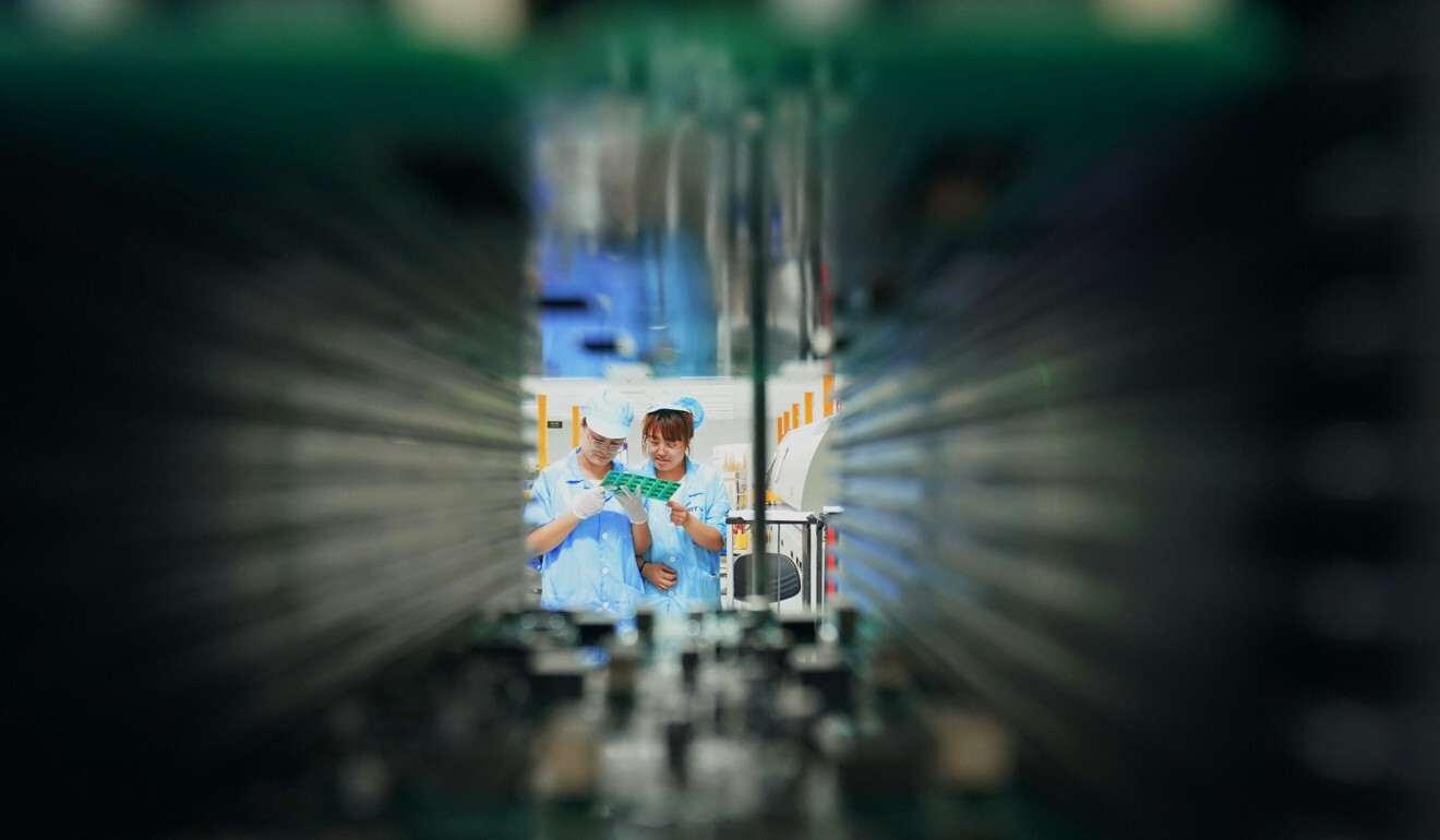 Workers at an electronics company in Qinhuangdao, north China’s Hebei province. Photo: Xinhua