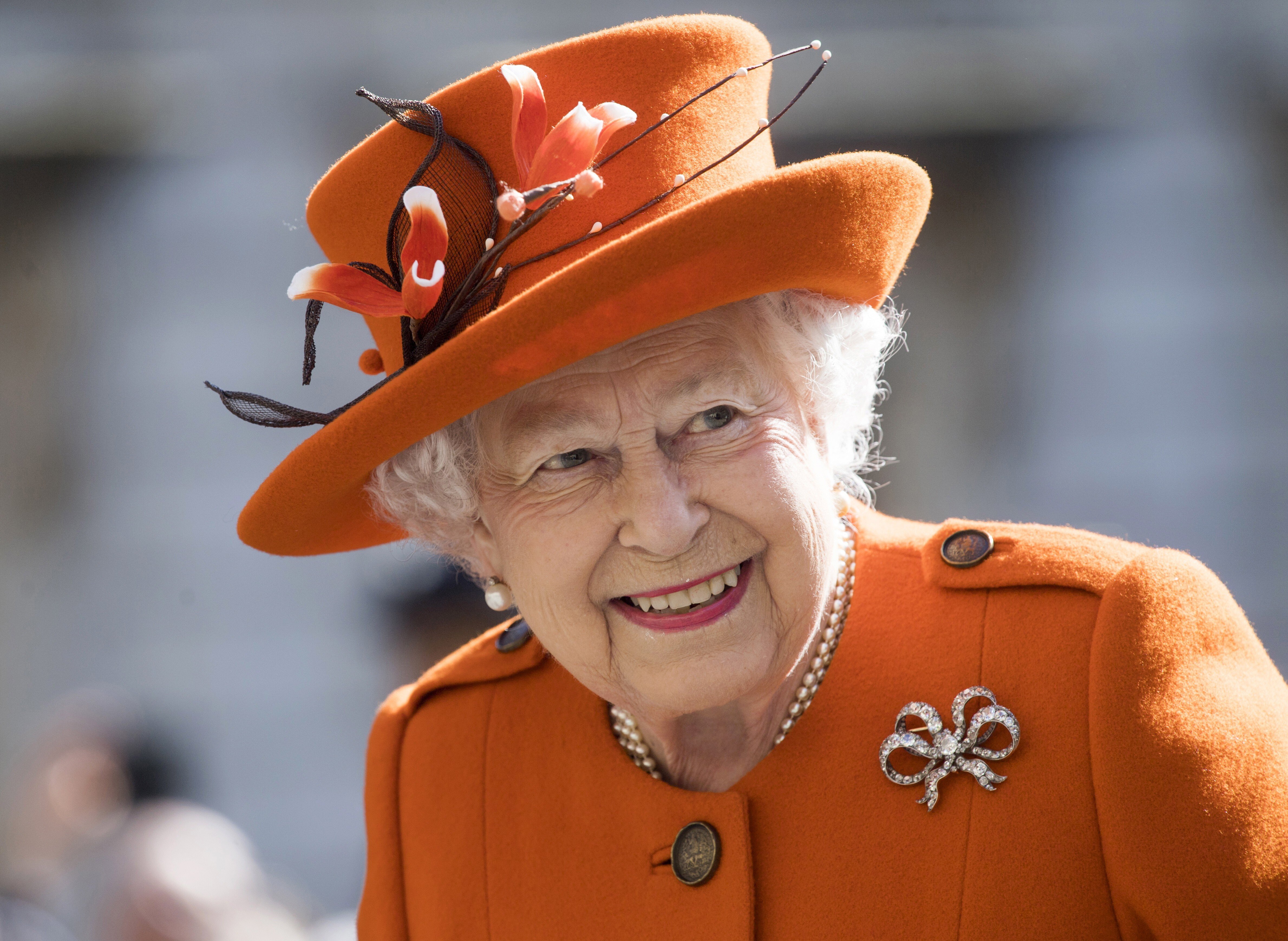 Britain's Queen Elizabeth may be 94 years old, but her personal style remains timeless with brands like Balmain, Valentino and Versace paying tribute to her in their latest collections. Photo: EPA-EFE
