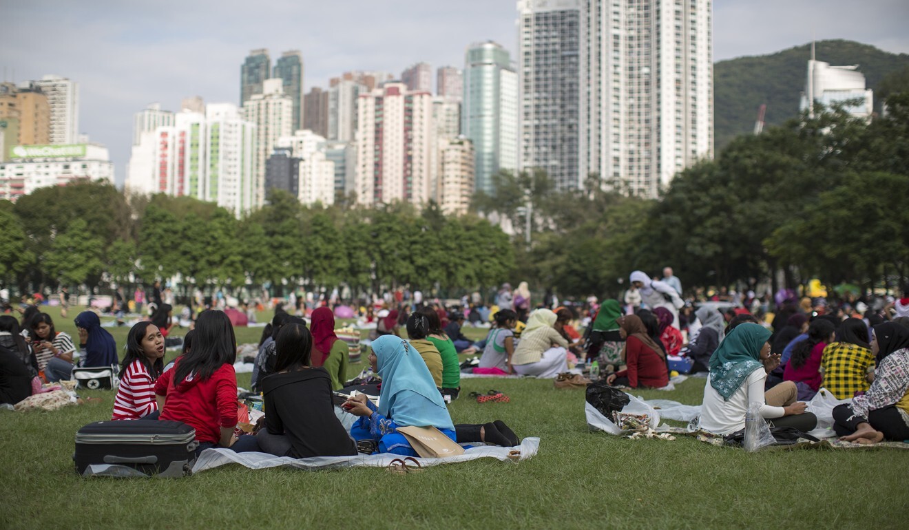 Migrant workers gather at Victoria Park in Hong Kong. Photo: Bloomberg