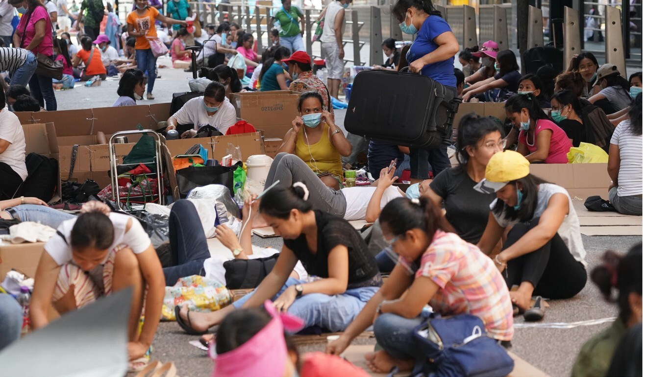 Domestic workers gather in groups on their day off. Photo: SCMP/Felix Wong