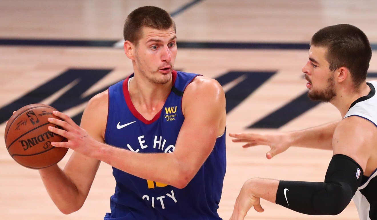 Denver Nuggets’ Nikola Jokic looks ahead of LA Clippers’ Ivica Zubac during an NBA game at AdventHealth Arena in Florida. Photo: USA Today
