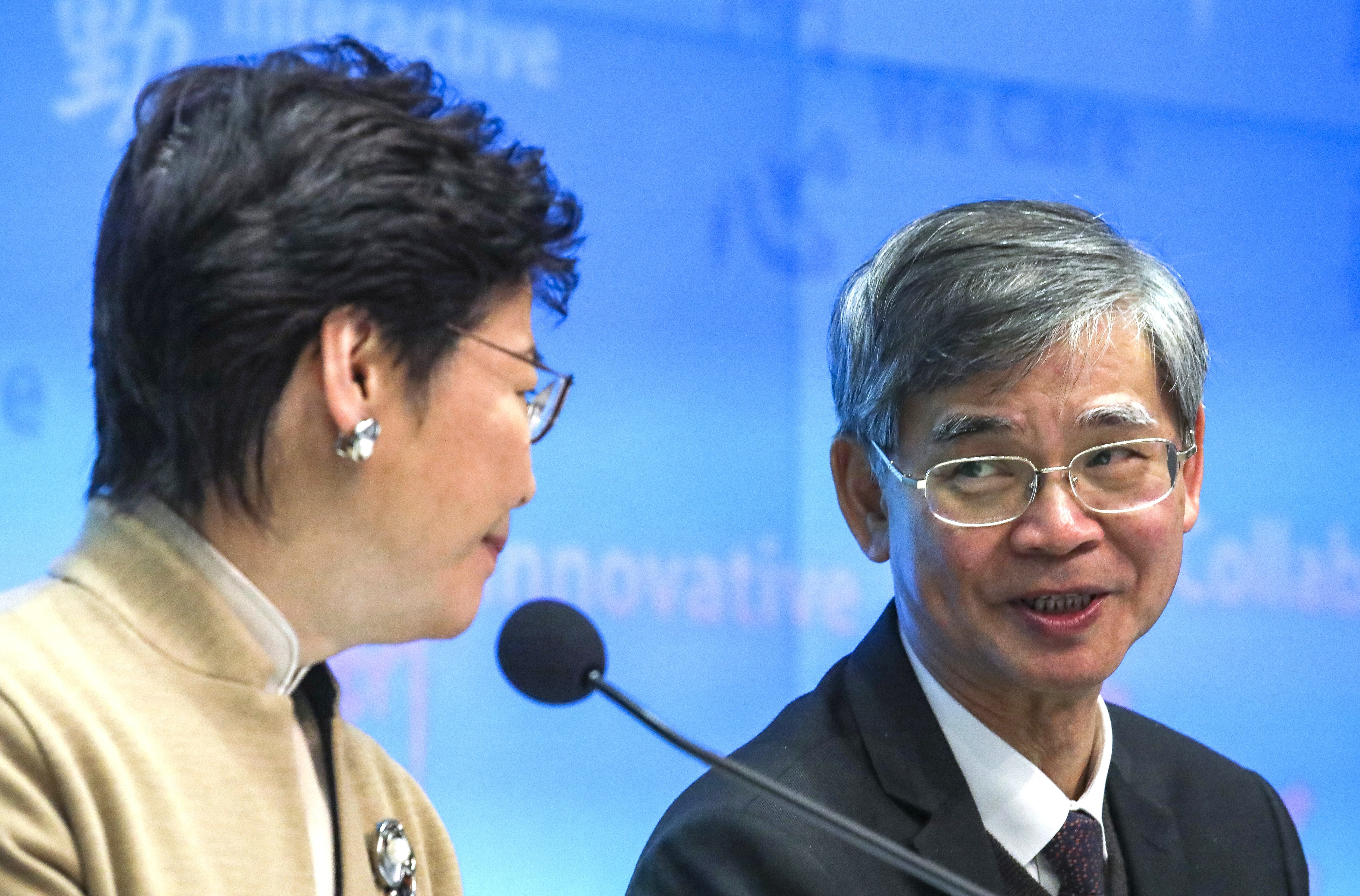 Hong Kong’s labour and welfare minister Law Chi-kwong (right). Photo: Felix Wong