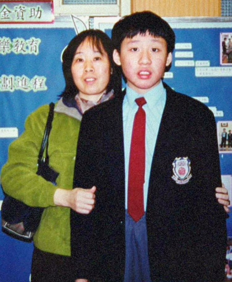Undated photo of Yu Man-hon (right), 15, with his mother Yu Lai Wai-ling. Yu Man-hon, who is autistic and needs daily medication, slipped across the Hong Kong-Shenzhen border and was shunted between officials before being released unaccompanied in Shenzhen. He has been missing ever since. Photo: SCMP