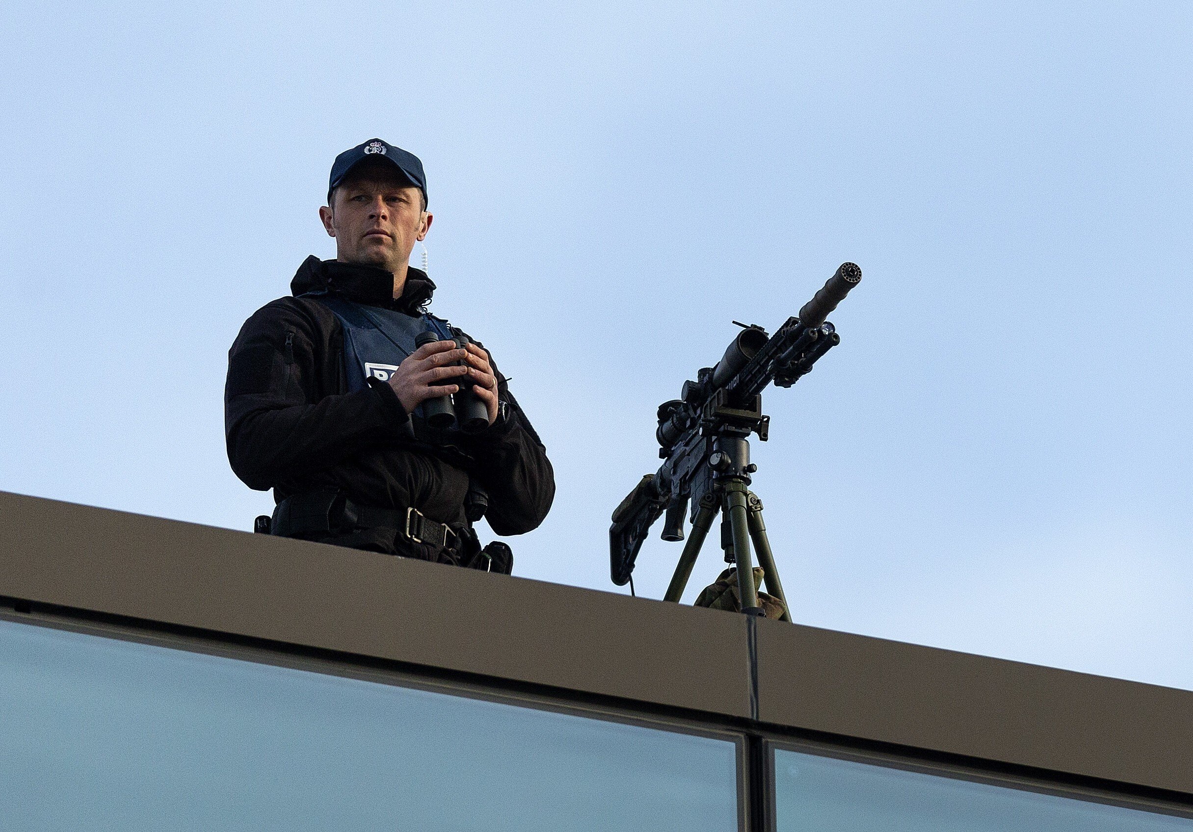 A police sniper watches over the street near the High Court in Christchurch during Brenton Tarrant’s trial. Photo: EPA-EFE
