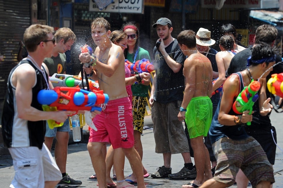 During Songkran, the Thai New Year festival, Khao San Road in Bangkok turns into a watery battleground. Photo: AFP