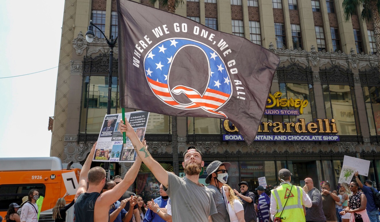 Conspiracy theorist QAnon demonstrators protest on Hollywood Boulevard in Los Angeles on Saturday. Photo: AFP