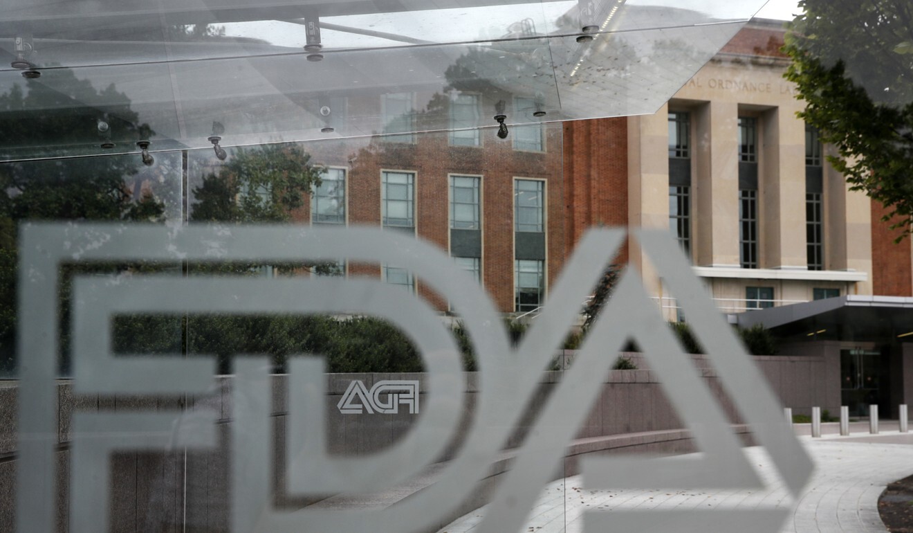 The US Food and Drug Administration building can be seen behind FDA logos at a bus stop on the agency’s campus in Silver Spring, Maryland. Photo: AP