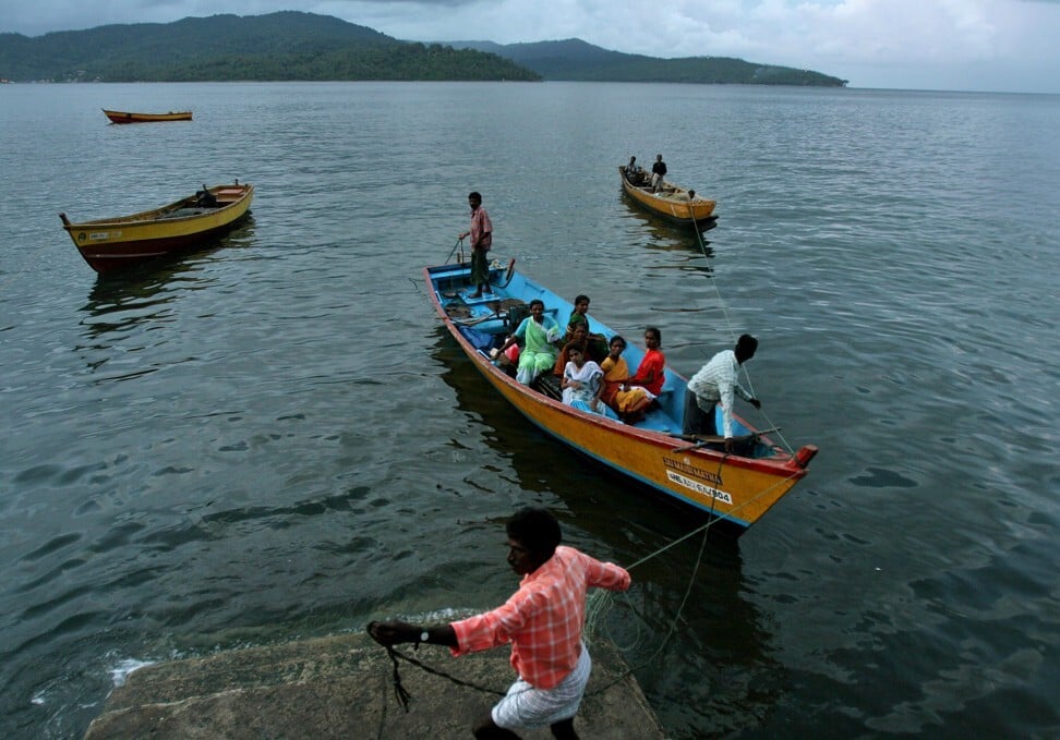 Fishermen and women return to their homes in Port Blair, in India’s Andaman and Nicobar Islands archipelago. Photo: AP
