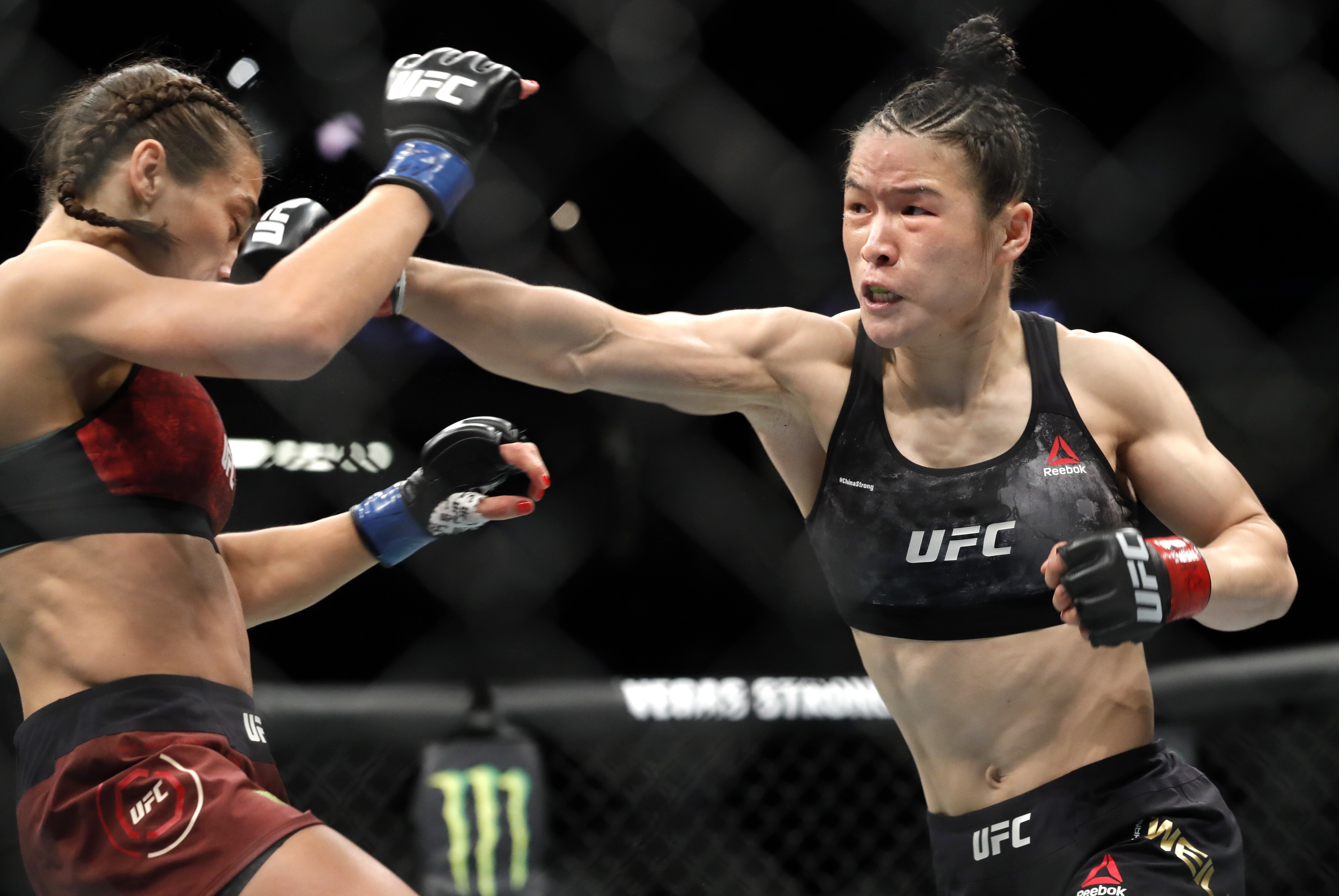 China’s Weili Zhang lands a punch on Poland’s Joanna Jedrzejczyk at UFC 248 at T-Mobile Arena in Las Vegas in March. Photo: AP