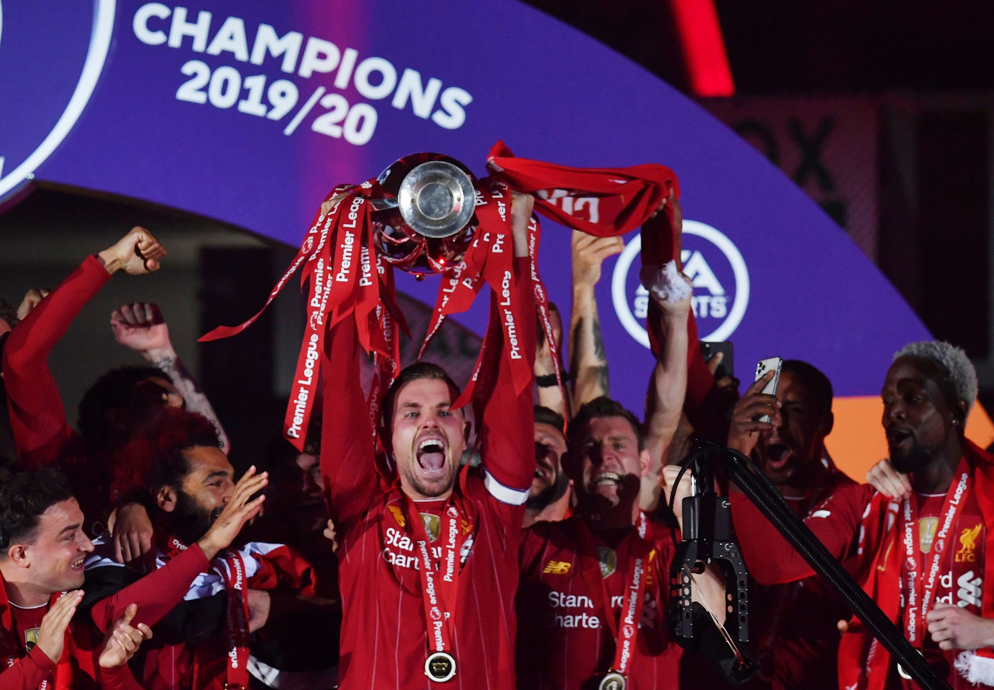 Liverpool’s Jordan Henderson lifts the English Premier League trophy but who will win the Fantasy Premier League? Photo: Reuters