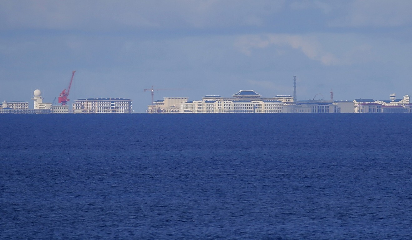 Chinese structures and buildings are seen on the Subi Reef in the Spratlys in 2017. Photo: AP