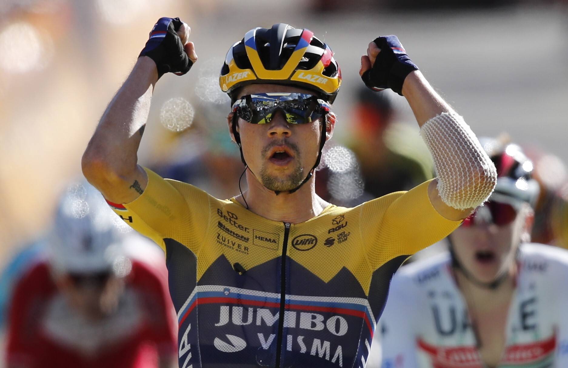 Slovenian rider Primoz Roglic of Jumbo-Visma team celebrates winning the fourth stage of the Tour de France. Photo: EPA