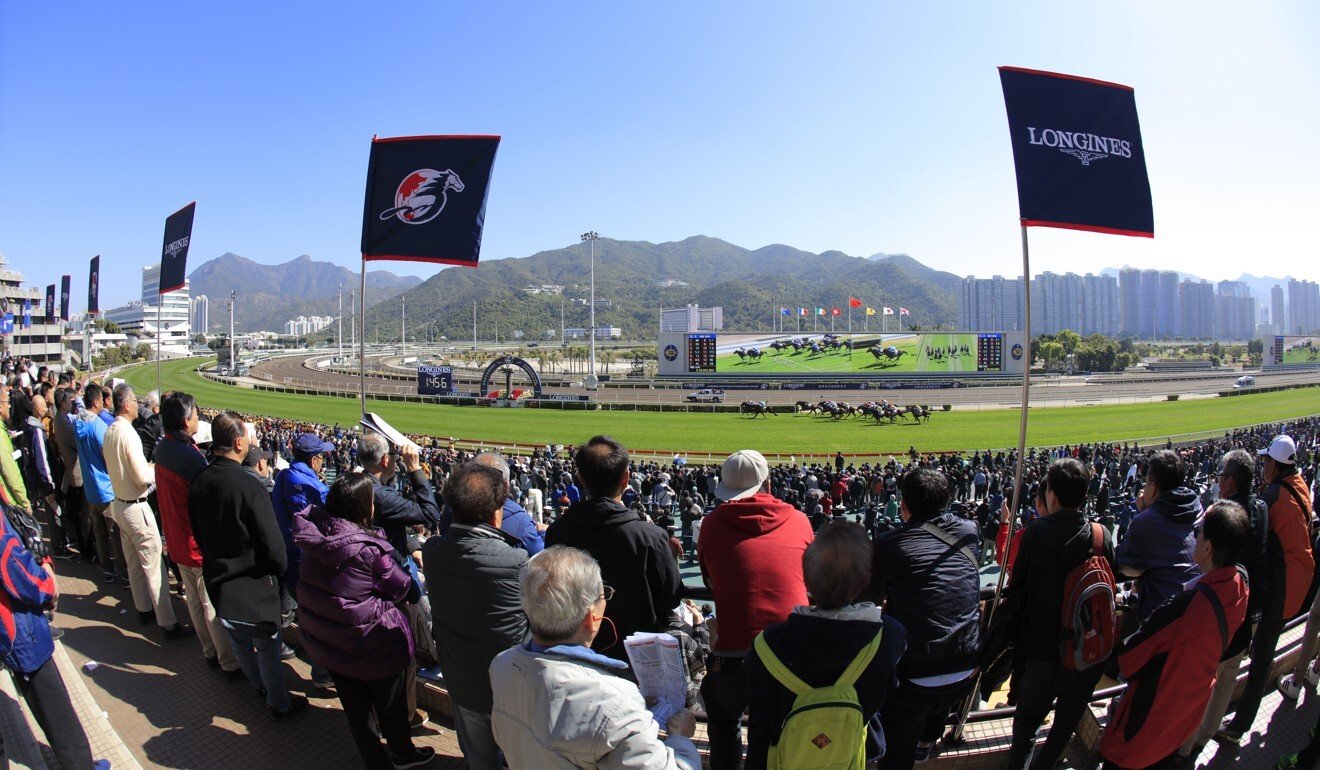 Fans watch horses compete at the 2019 Hong Kong International Races.