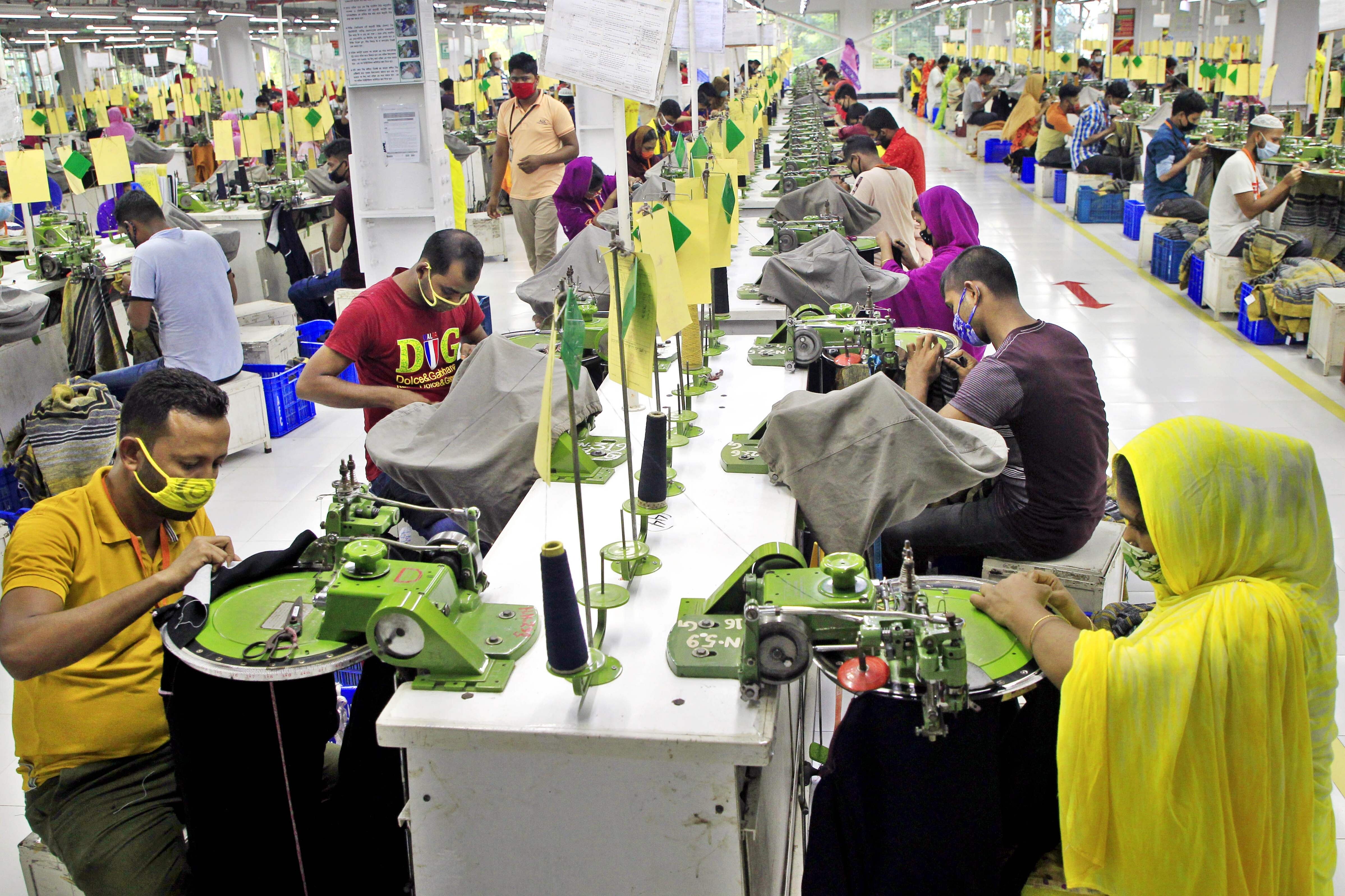 Bangladeshi labourers work in a garment factory in Gazipur. Photo: AFP
