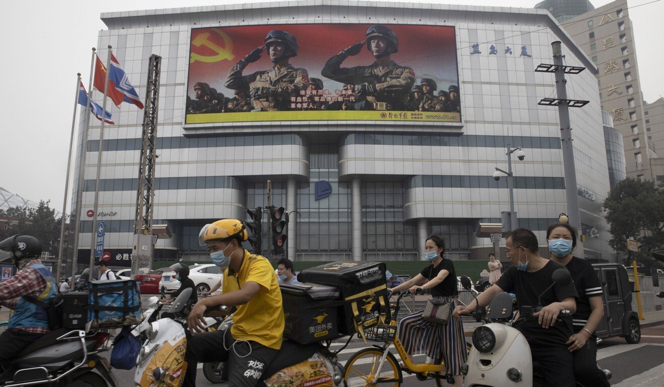 A Chinese military poster in Beijing. Photo: AP