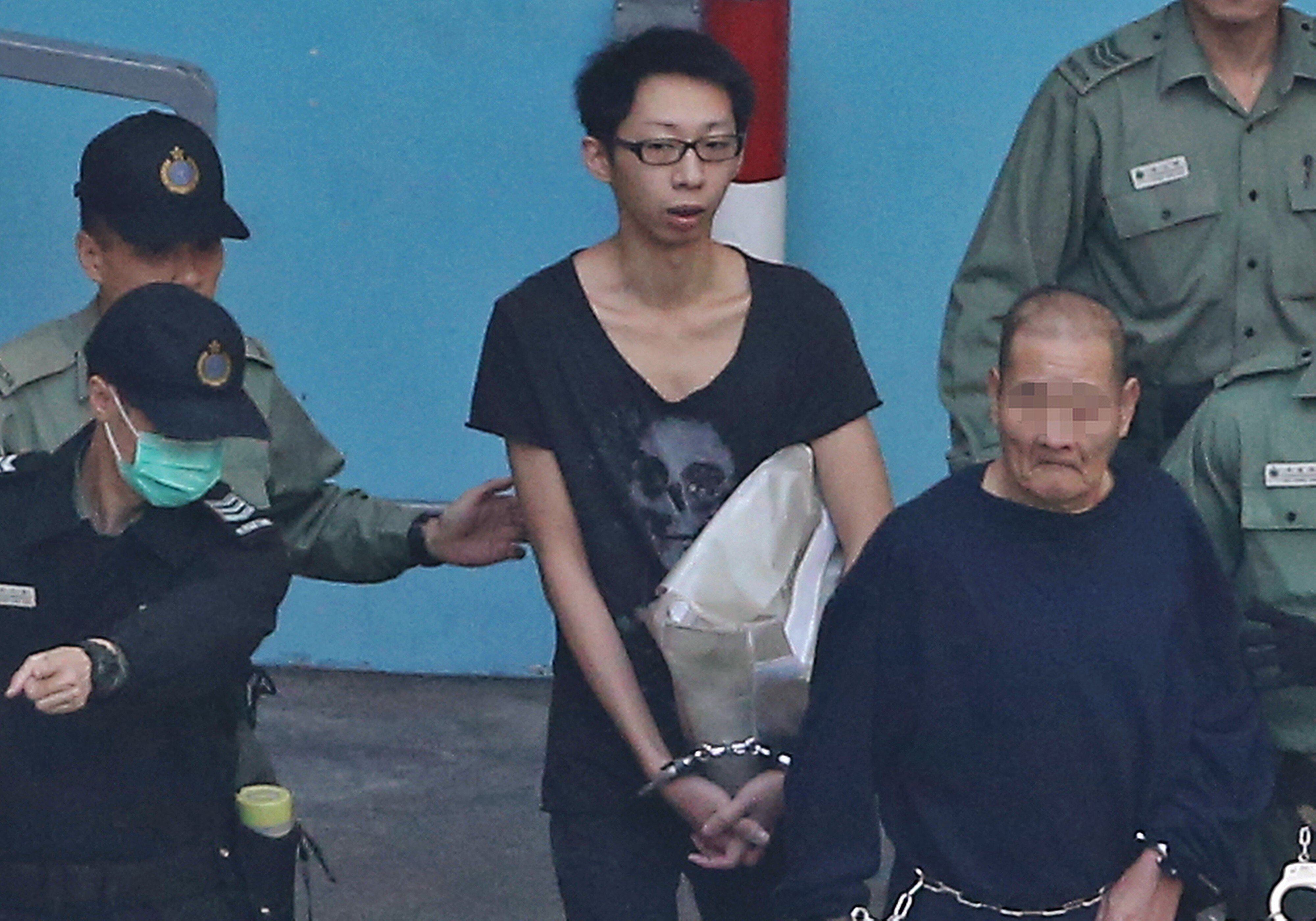 Billy Chiu being escorted out of the Lai Chi Kok Reception Centre in 2017. Photo: Dickson Lee