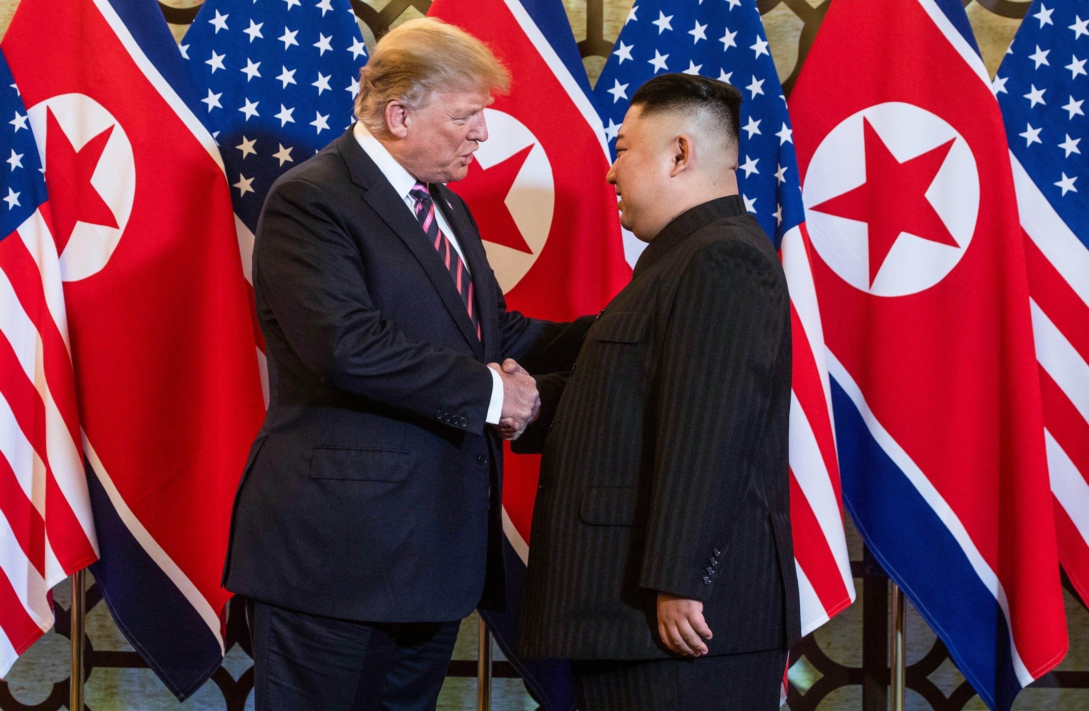 US President Donald Trump shakes hands with North Korean leader Kim Jong-un during the Hanoi summit in 2019. Photo: AFP