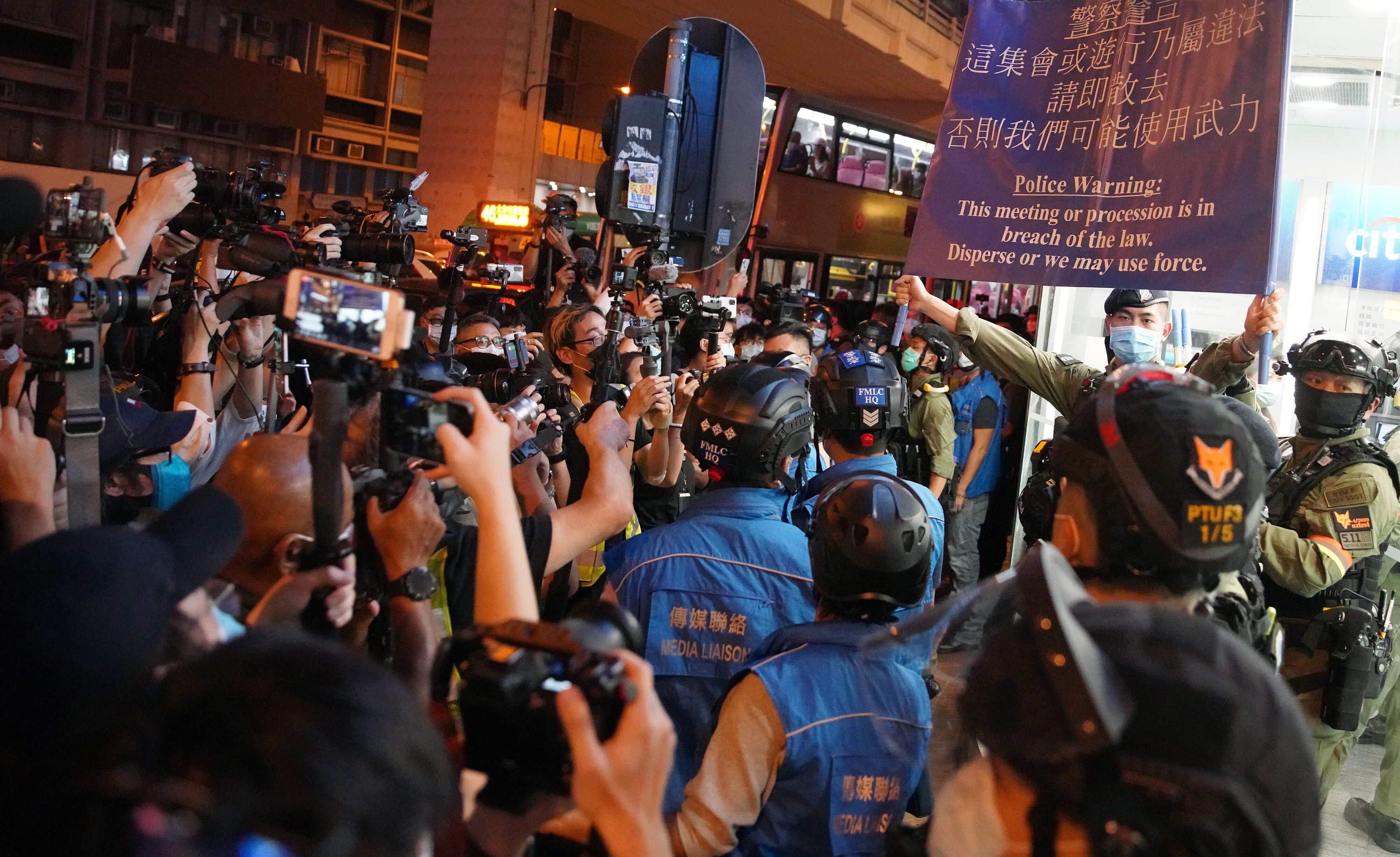 Police warn anti-government protestors to disperse, as they gather outside of the Prince Edward MTR station in memory of the first anniversary of the (831) Aug 31 Prince Edward MTR incident. Photo: SCMP / Winson Wong