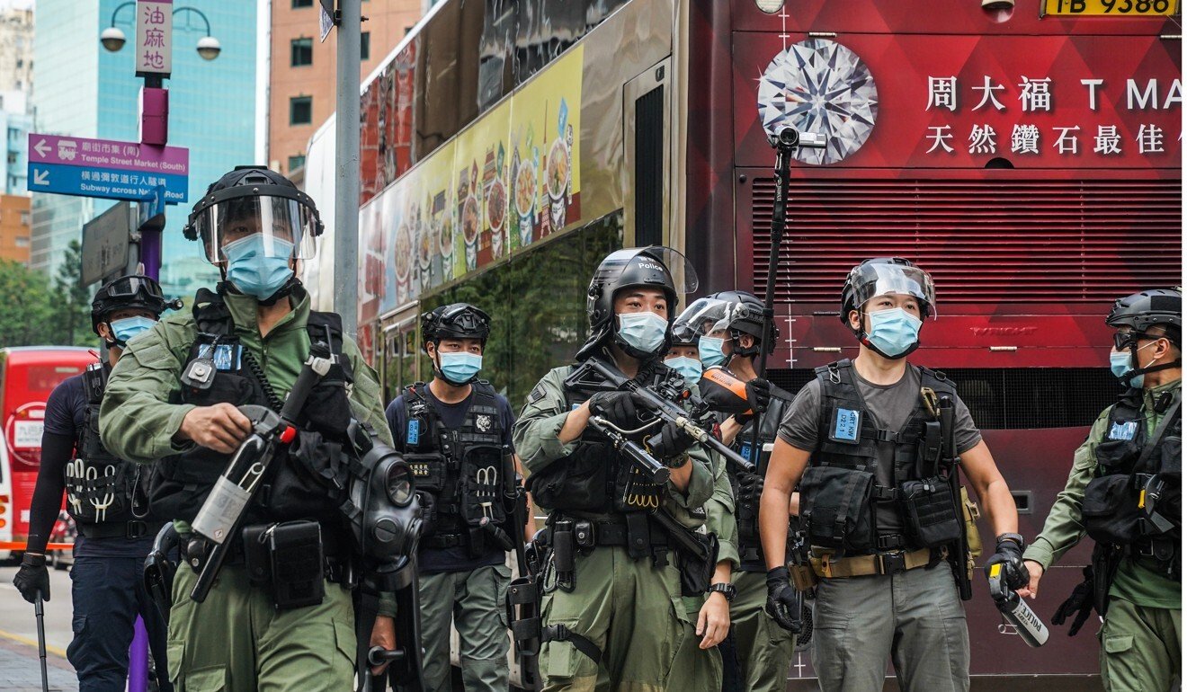 Riot police on the streets of Hong Kong. Photo: Bloomberg