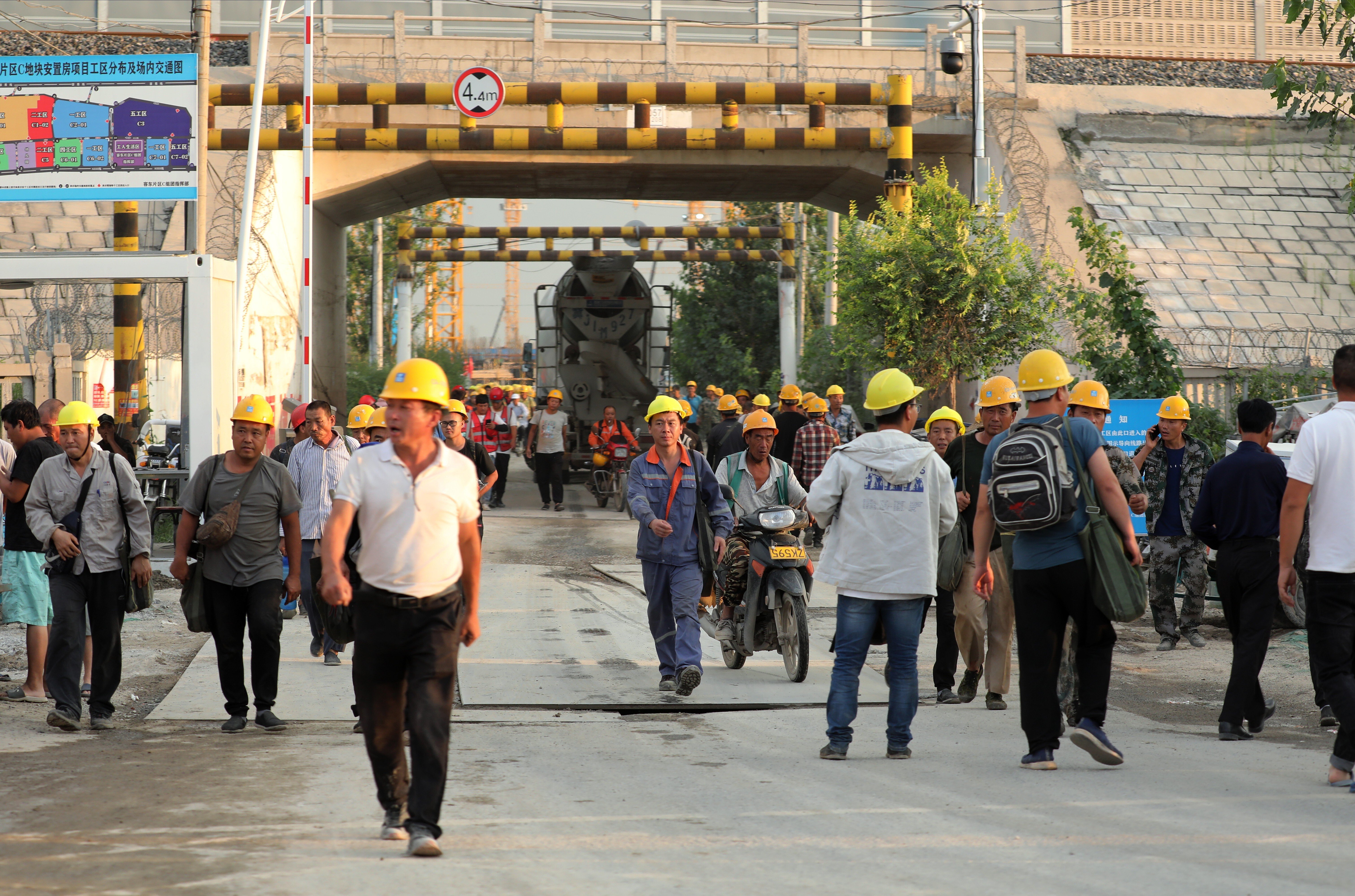 Workers leave a construction site in the Rongdong residential zone that is expected to eventually be home to 170,000 people in the ambitious Xiongan New Area. Photo: Simon Song