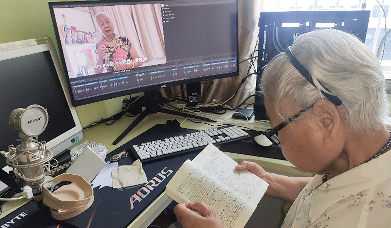 Jiang Minci, a retired railway engineer, checks the dictionary while preparing for a video, produced with the aid of her grandson. Photo: Handout