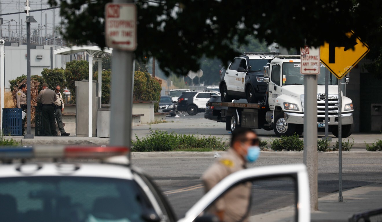 A Los Angeles County Sheriffs Department vehicle is towed from the scene. Photo: Reuters