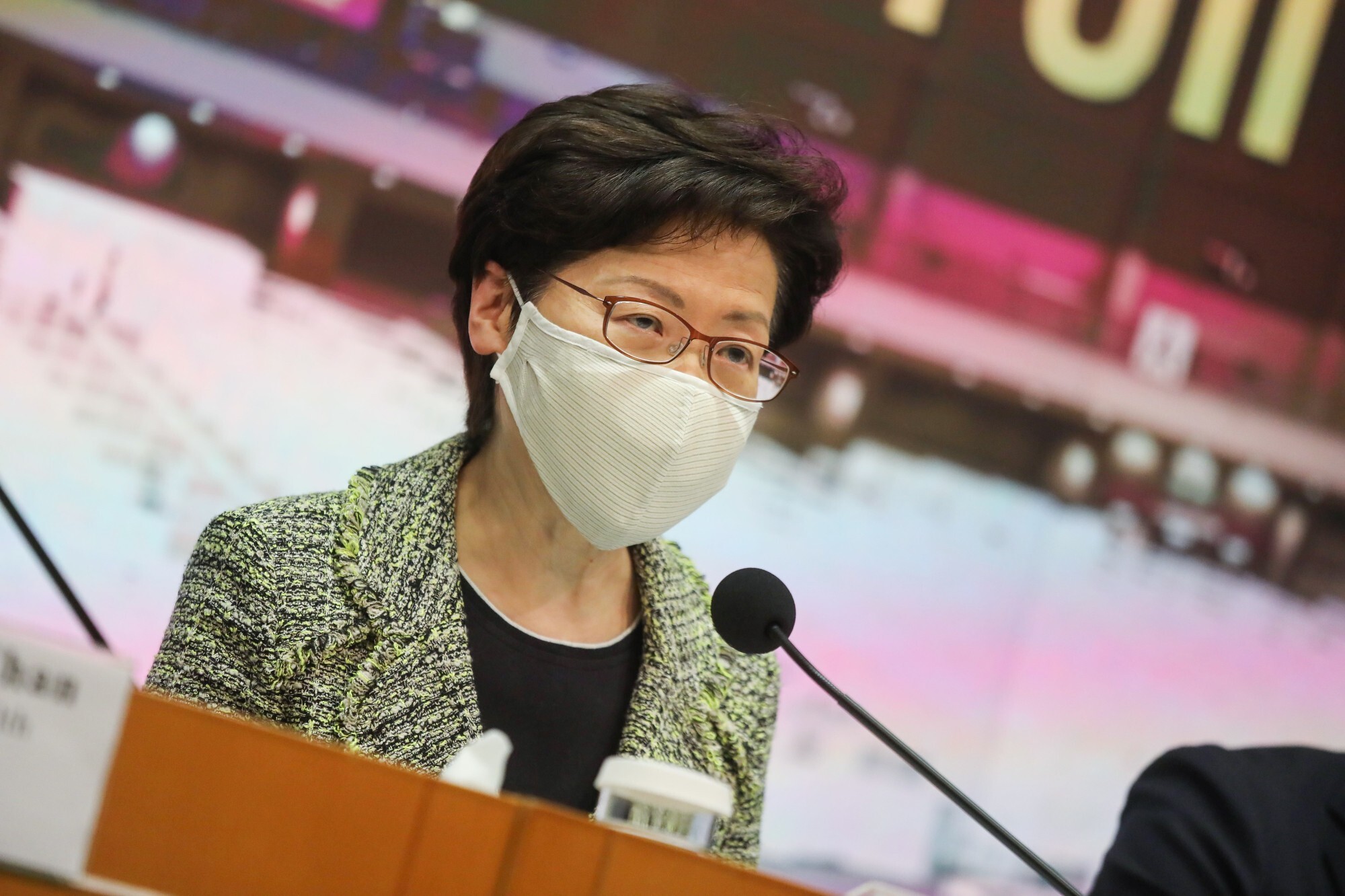 Hong Kong Chief Executive Carrie Lam Cheng Yuet-ngor wears a CU Mask while speaking from the Central Government Offices in Tamar. Photo: SCMP / K. Y. Cheng