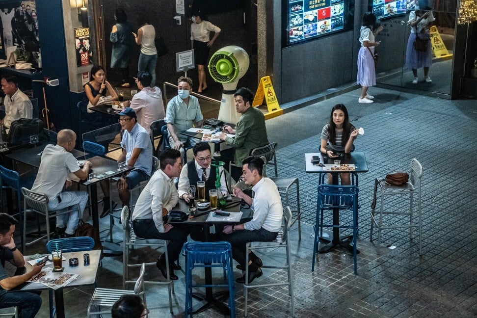 People at a restaurant at Tsim Sha Tsui on September 11. Hong Kong doubled the number of people allowed to gather in public and reopened sports venues that day, in the latest easing of Covid-19 restrictions. Photo: Bloomberg